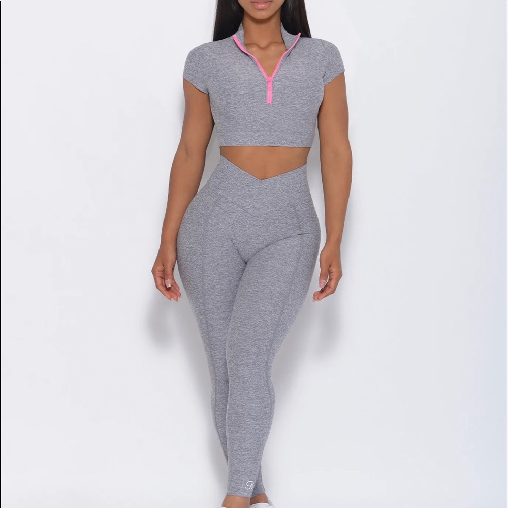 Bombshell Sportswear Brazilian contour leggings and neon zip top